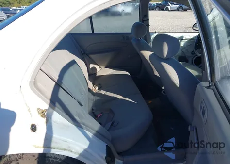 2002 Ford Escort Fleet z USA, uszkodzony, nr VIN 3FAFP13P52R189595